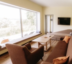 Двухместный коттедж с красивым видом из окна двуспальная кровать в Банный остров