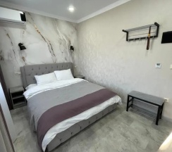 Двухместный номер Standard с балконом двуспальная кровать в Гостевой дом на Октябрьской