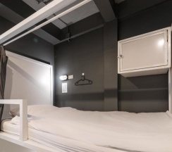Кровать в общем номере в The Cocoon Hostel