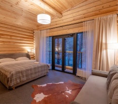 Двухместный люкс двуспальная кровать в Skazka Lodge