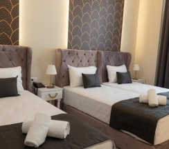 Трёхместный номер Deluxe в Modern Luxury Hotel