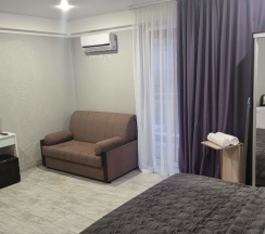 Четырехместный номер с балконом в GB