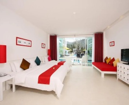 Двухместный номер Deluxe с выходом к бассейну Serene Wing двуспальная кровать в Курортный отель The Old Phuket - Karon Beach Resort