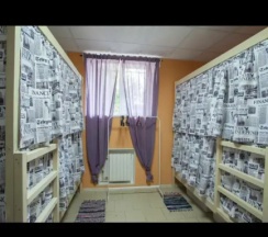 Кровать в общем номере с красивым видом из окна (общая ванная комната) в Рус-Семеновская