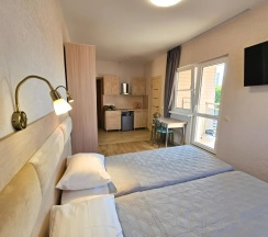 Двухместная студия Мансарда с балконом и с красивым видом из окна 2 отдельные кровати в Милана