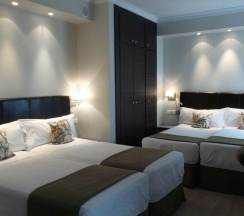 Четырёхместный номер в Hotel Moderno