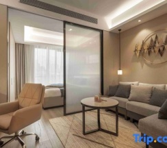 Люкс Deluxe c 1 комнатой в Chongqing Yitang Hotel