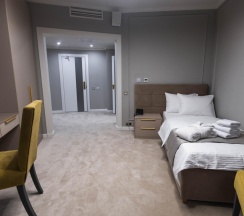 Номер стандарт улучшенный с 1 односпальной кроватью (с завтраком) в Тарей