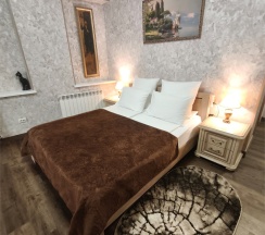 Двухместный номер категории "Семейный-Светлый" с двуспальной кроватью, с возможностью двух дополнительных мест. в Викинг