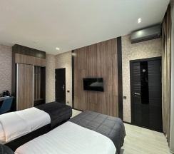 Номер Luxury в Home Hotel