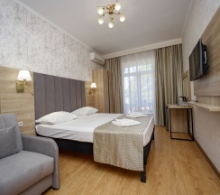 Двухместный номер Comfort с балконом и с видом на парк двуспальная кровать в Прометей 3