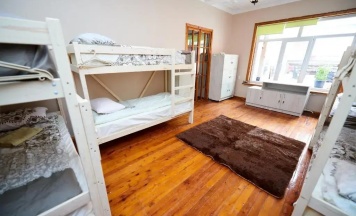 Кровать в общем номере 4 двухъярусные кровати в Wanderlust Hostel