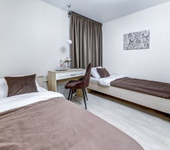 Двухместная комната с 2 односпальными кроватями и собственной ванной комнатой в МК Распутина