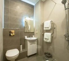 Четырёхместная семейная номер-студия Deluxe в Ботанический сад