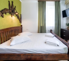 Двухместный номер Classic с видом на море и дендрарий двуспальная кровать в Delsochi