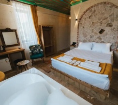 Двухместный люкс двуспальная кровать в La Casa Cave