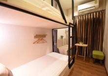 Кровать в общем номере в Silom Forest Exclusive Residence