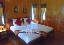 Двухместный номер Deluxe с балконом и с видом на сад двуспальная кровать в Macura Resort