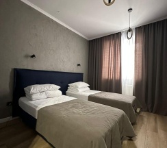 Номер стандарт с 2 односпальными кроватями с балконом в Альпина