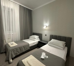 Номер эконом с 2 односпальными кроватями в Альпина