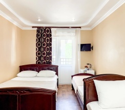 Четырёхместный номер Standard с балконом в Эксклюзив