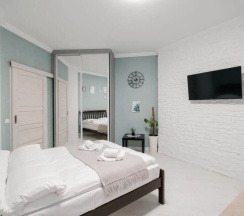Четырёхместные апартаменты c 1 комнатой с балконом в Апартаменты Light apartment lxt.by