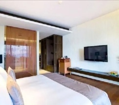 Двухместный номер с видом на море двуспальная кровать в Hansar Samui Resort & Spa