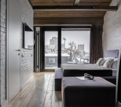 Room for romantic. Мансарда с террасой и камином размещение 1-2 человека. в Nikolaevbuilding