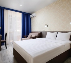 Номер стандарт с 1 двуспальной кроватью в Undersun