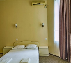 Номер стандарт семейный с 1 двуспальной кроватью в Оптима