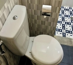 Двухместный номер Standard с балконом и с видом на сад двуспальная кровать в Mai Guesthouse Sanur