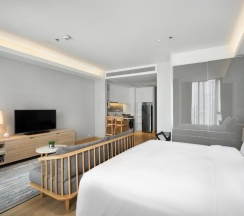 Двухместная студия Deluxe с 2 комнатами 2 отдельные кровати в Oakwood Suites Bangkok