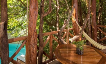Двухместный люкс Oasis двуспальная кровать в Shangri-la Caribe Beach Village Resort