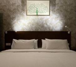 Семейный номер Standard с балконом и с видом на сад в Hotel City Centre