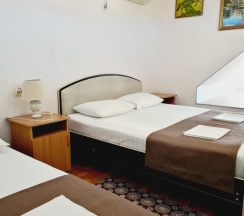 4-местный номер стандарт семейный (мансарда) в Золотой Лев