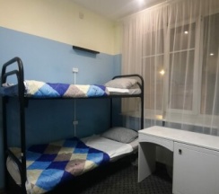 Кровать в 8-и местной общей мужской комнате в Likehome