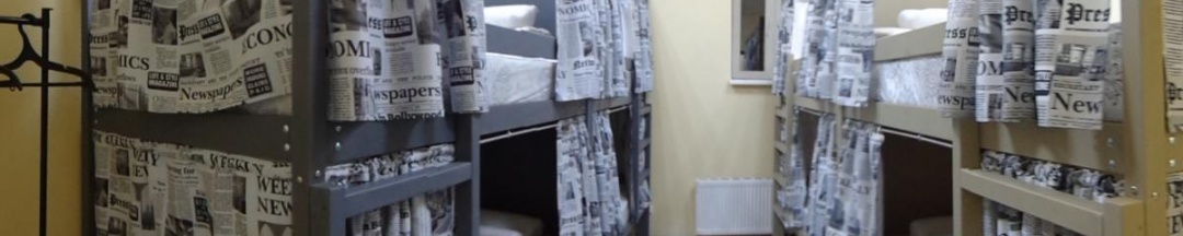 Кровать в 8-местном общем женском номере в Рус