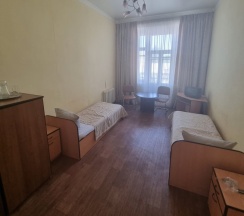 Кровать в общем номере в Волга