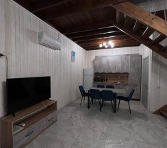 Коттедж с двумя спальнями с видом на море в 4 Сезона