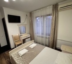 Номер с двуспальной кроватью в Киви