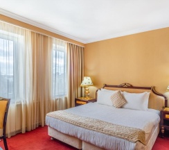 Номер стандарт бизнес с 1 двуспальной кроватью в Гранд мандарин