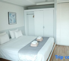 Семейный люкс с 2 комнатами с видом на море в The Beach Front Resort Pattaya  - SHA Plus