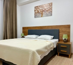 Двухуровневый ПОЛУЛЮКС с зоной отдыха на крыше и видом на бассейн в Santorini Family Club