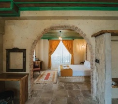 Двухместный люкс двуспальная кровать в La Casa Cave