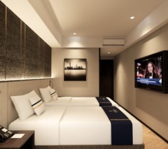 Двухместный номер Deluxe 2 отдельные кровати в Fieris Hotel Rawamangun