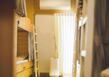 Кровать в общем номере в Pakping Hostel