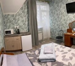 Двухместный номер Standard с балконом и с красивым видом из окна двуспальная кровать в Дюна-центр