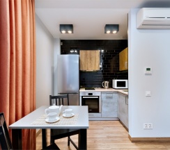 Однокомнатные апартаменты-студия с обеденной зоной в APARTVILLE