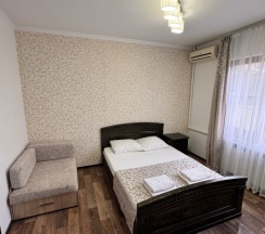 Номер с двуспальной кроватью в Киви