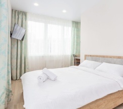 Номер Superior в Квартира на сутки Маяк Минск Метро 5 мин Wi-Fi Кондиционер Кухня объединена с жилой зоной Отдельная спальня Отчётные документы